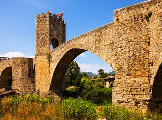 Obraz premium Medieval bridge with gate. Besalu