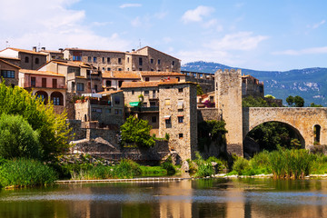 Fototapeta premium Medieval town on the banks of the river