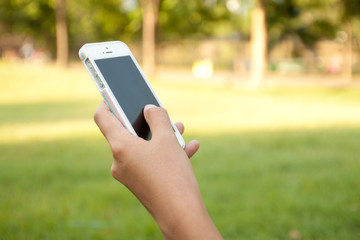 Woman hand holding smartphone
