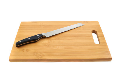 Steel kitchen knife on cutting board