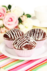 Sweet chocolate cupcakes close up