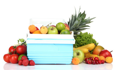 Fresh fruits and vegetables in mini refrigerator, isolated