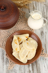 Tasty dumplings with fried onion
