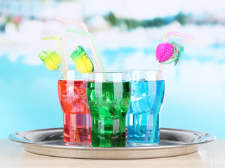 Different cocktails on bright background