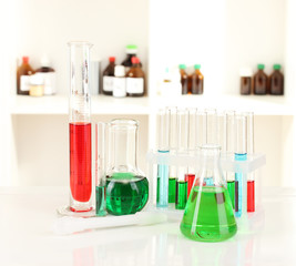 Different laboratory glassware with color liquid