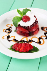 Tasty jelly dessert with fresh berries,