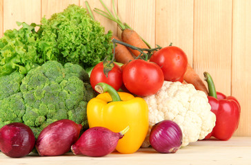Fresh vegetables on wooden background