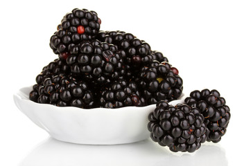 Sweet blackberry in bowl isolated on white