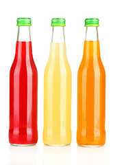 Bottles with tasty drink, isolated on white