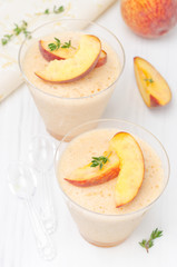 peach and apple souffle in portioned glasses, top view