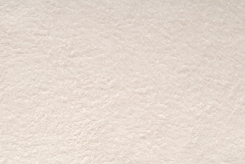 A white texture background is out of terry fabric.