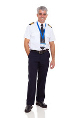 middle aged man wearing airline pilot uniform