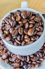 Coffee beans on cup