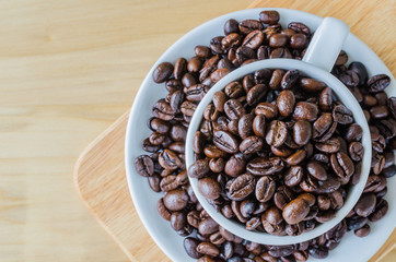 Coffee beans on cup
