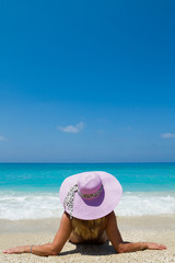 Fototapeta na wymiar Summer vacation woman on beach
