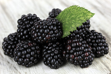 Sweet blackberries on table close-up