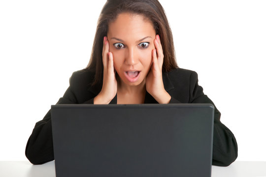 Woman In Panic Looking At A Computer Monitor