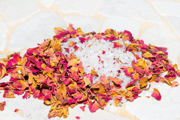 Fragrant dried rose petals with bath salts