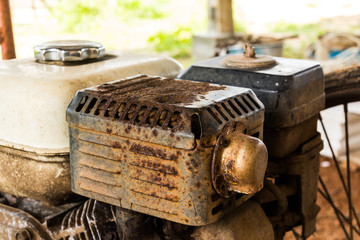 old rusty engine of lawnmower