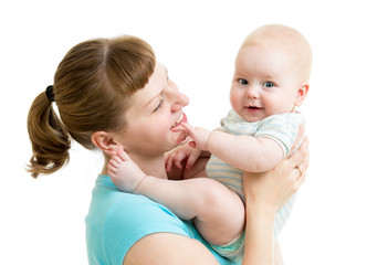 loving mother having fun with baby boy isolated on white