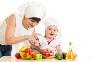 Chef mom and kid preparing healthy food