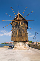 Fototapeta na wymiar Old mill on the entrance of old Bulgarian town Nessebar