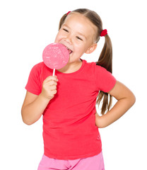 Little girl with lollipop