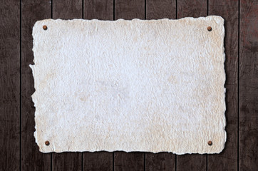 Fototapeta premium Paper on Wood Background