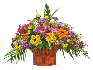 Colorful flower bouquet arrangement centerpiece in wicker basket