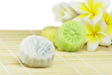 snow skin mooncakes isolated on bamboo