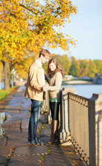 Romantic couple on a beautiful autumn day