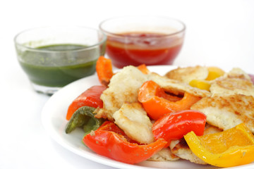 Delicious roasted fish, capsicum & onion at shallow DOF