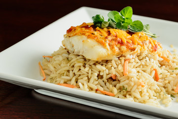 Grilled Tilapia with Tomato Sauce and Cheddar Cheese