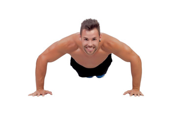 Fototapeta na wymiar Muscular man doing pushups