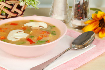Fragrant soup in pink plate