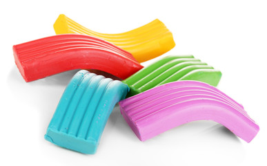 Children bright plasticine isolated on white