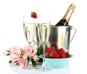 Romantic still life with champagne, strawberry and pink roses,