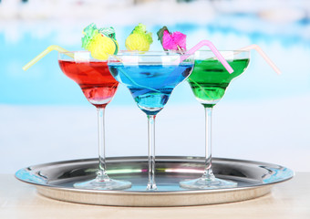 Different cocktails on bright background