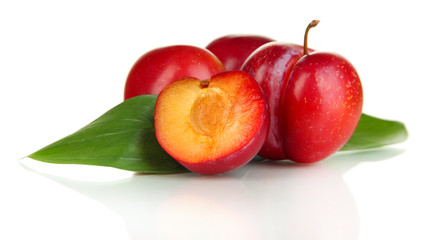 Ripe plums isolated on white
