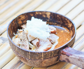 Thai spicy noodle in coconut shell