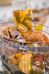 Grocery store. Supermarket basket full of different food