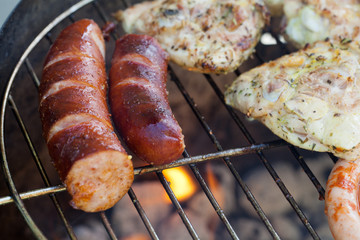 barbecue with delicious grilled meat on grill