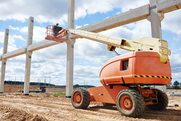 builder worker stop up concrete pole