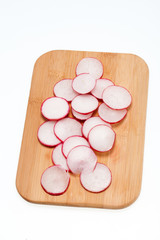 Garden radish on wooden board