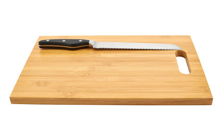 Steel kitchen knife on cutting board