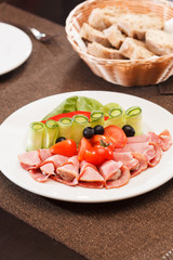 Meat appetizer with vegetables