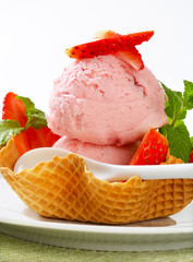 Pink ice cream in waffle basket
