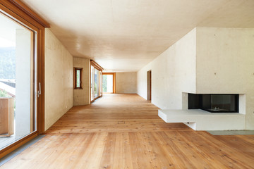 new apartment in cement and wood,room with fireplace