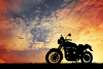 Obraz na płótnie Canvas motorcycle at sunset