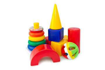 Box of bricks with the pyramid and the rattle.